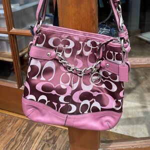 Coach crossbody shoulder bag with chain accent. Beautiful mauve pink signature